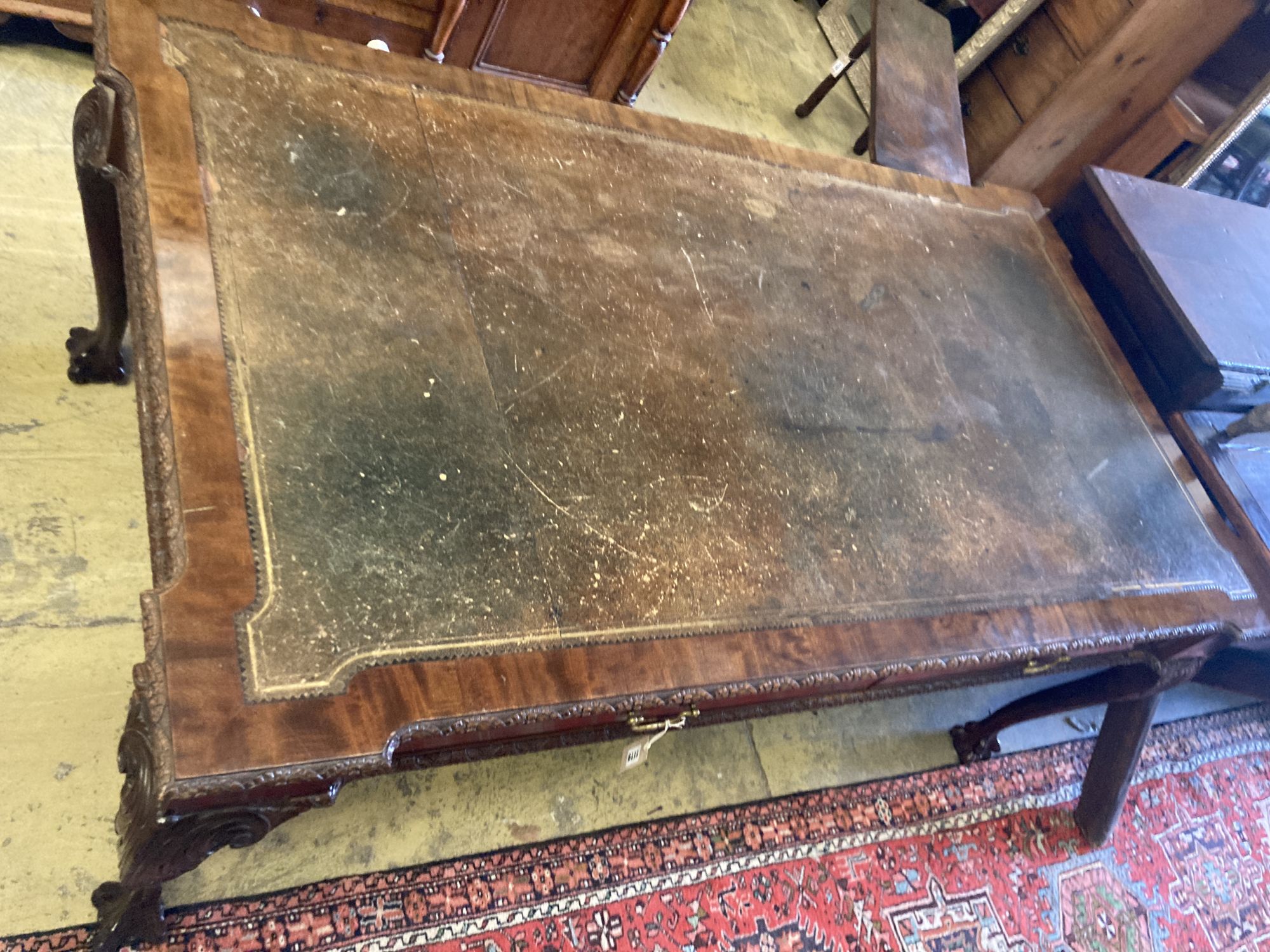 A George III style mahogany leather topped writing table, width 182cm, depth 104cm, height 76cm